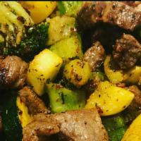 Steak Loaded Rice · Comes with zucchini, squash, broccoli, garlic butter.