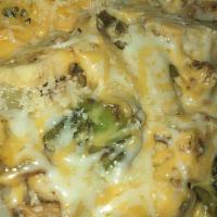 Grilled Chicken Loaded Potato · Loaded potato comes with broccoli, shredded cheese, sour cream on the side, dinner roll.