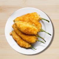 Jazz Jalapeno Poppers · Jalapenos, seasoned, coated with crumbs and fried till crisp and golden
