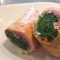 Antipasto Wrap · Antipasto wrap with turkey, ham, salami, prosciutto, roasted onions, bell peppers, forest gr...
