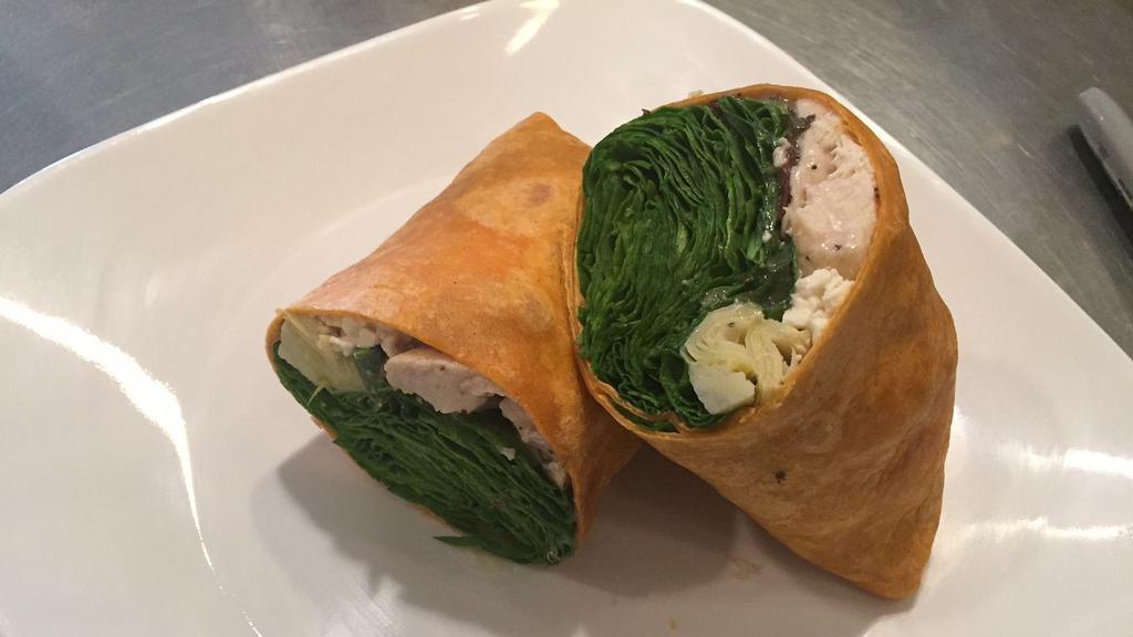 Mediterranean Wrap · Mediterranean wrap with chicken, kalamata olives, artichokes, feta cheese, and forest greens with a red wine vinaigrette.