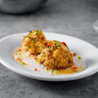 Sizzling Crab Cakes · Ruth’s favorite. Two jumbo lump crab cakes with sizzling lemon butter. 320 cal.