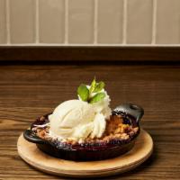 Wild Berry Cobbler · vanilla bean ice cream, whipped cream