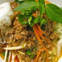 #47 - Khao Poon · Lao-styled curry with grounded chicken and grounded fish over vermicelli noodles. Served fre...