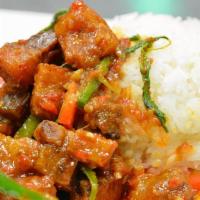 #79 - Spicy Rind Pork On Rice · Stir-fried rind pork with red curry paste, basil, red and green pepper over rice. (Entree ve...