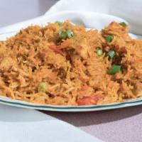 Sahjahani Biryani · Chicken and peas in herbs and spices then baked with basmati rice.