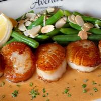 Sea Scallops · Green beans, almonds, and lobster butter.