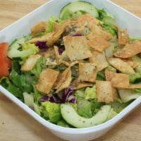 Fattoush Salad · Lettuce, tomato cucumber, green pepper, red cabbage, fresh mint, pita chips, lemon and olive...