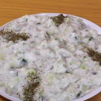 Cucumber Yogurt Salad · Cucumber, yogurt, mint, and garlic.