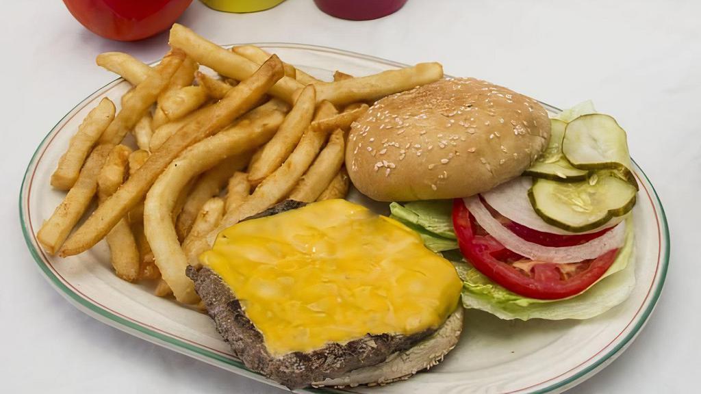 Cheeseburger · Lettuce, tomato, pickles

This item may be served undercooked. Consuming raw or undercooked meats, poultry, seafood, shellfish, or eggs may increase your risk of foodborne illness. Please inform your server if you have any allergic conditions before ordering.