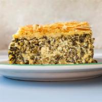 Spinach Pie Dinner · Our homemade spinach pie rich with feta cheese, eggs & onion baked in a filo pastry.