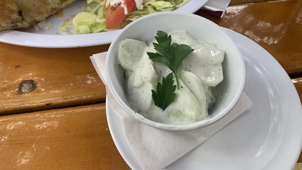 House Salad · Crispy chilled iceburg lettuce, with tomato, cucumber, green pepper and onion.