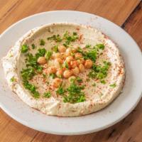 Hummus Small · Chickpeas púreed with tahini sauce lemon juice and a hint of fresh garlic olive oil