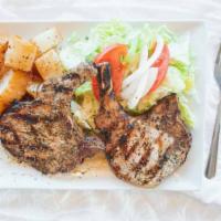 Pork Chops Dinner · Served with Salad, Greek Potato & Bread.