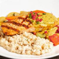 Wood Grilled Salmon · Wood grilled salmon, mushroom risotto, extra virgin olive oil, sautéed vegetables, and curry...
