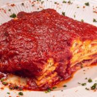 Baked Lasagna (Full Order Only) · Wide noodles in layers with fresh ground beef, ricotta cheese, tomato sauce and provolone ch...