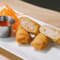 Thai Spring Rolls (3) · Hand rolled in house, filled with shrimp and pork, served with a side of duck sauce.