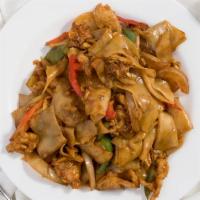 Thai Chow Fun · Stir fried wide rice noodles with egg, onions, carrots, green, and red bell peppers in Thai ...