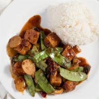 Kung Pao Tofu · Deep fried tofu tossed with zucchini, water chestnut, mushroom, and peanut in a spicy garlic...