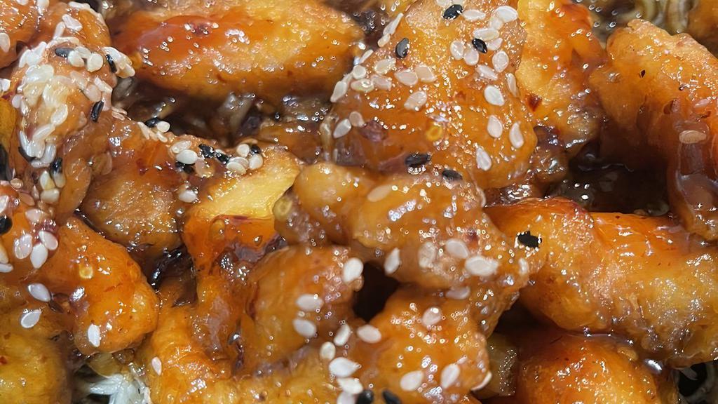 Sesame Chicken · Hot. Deep fried Chicken in a special sauce topped with sesame seeds.