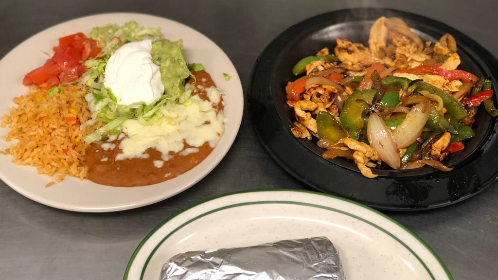 Lunch Fajitas · A lunch-sized portion of sizzling fajitas with your choice of beef or chicken and guacamole salad.