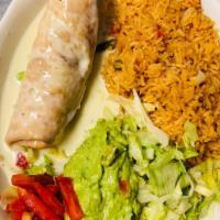Lunch Chimichanga · Flour tortilla soft or fried, filled with beef tips and topped with lettuce, tomatoes, and g...