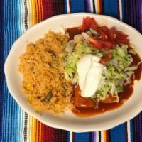 Lunch Special No. 6 · Two chicken enchiladas with rice, topped with lettuce.