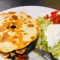 Hawaiian Quesadilla · Two flour tortillas layered with grilled chicken, pineapple and bell peppers. Served with so...