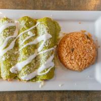 Enchiladas Suizas · three chicken enchiladas coverd in a special creamy poblano sauce topped with cotija cheese ...