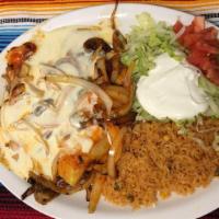 Pollo Marina · Marinated, grilled chicken breast with grilled onions, mushrooms, and melted cheese. Served ...