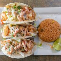 Dj Shrimp Tacos · Three tacos filled with grilled shrimp topped with chipotle sauce (not spicy), cole slaw and...