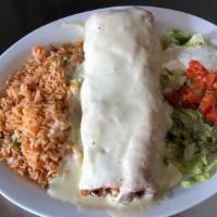 Shrimp Chimichanga · One big chimichanga fried with shrimp, tomatoes, onions and bell peppers. Topped with cheese...