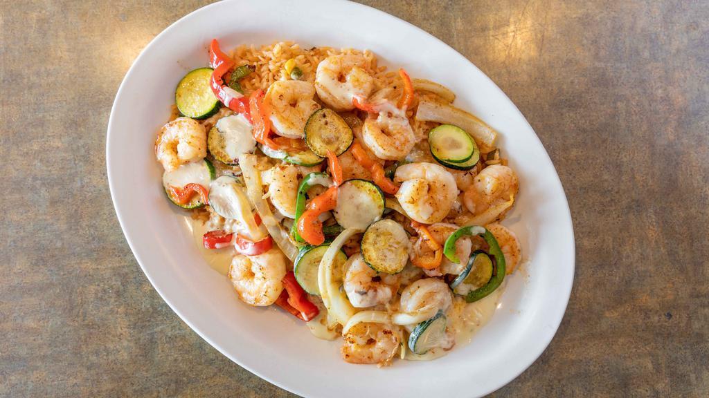 Camaron Jalisco · Grilled shrimp cooked with zucchini, bell peppers, onions, and tomatoes. Served on a bed of rice and topped with cheese dip and special Jalisco sauce.