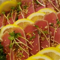 Tuna Tataki · Lightly seared tuna on top of vegetables. Contains raw or undercooked ingredients.