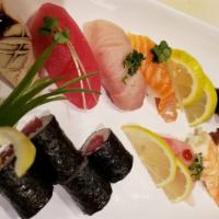 Sushi Regular · Chef's choice of eight pieces of assorted sushi with a tuna or California roll. Contains raw...