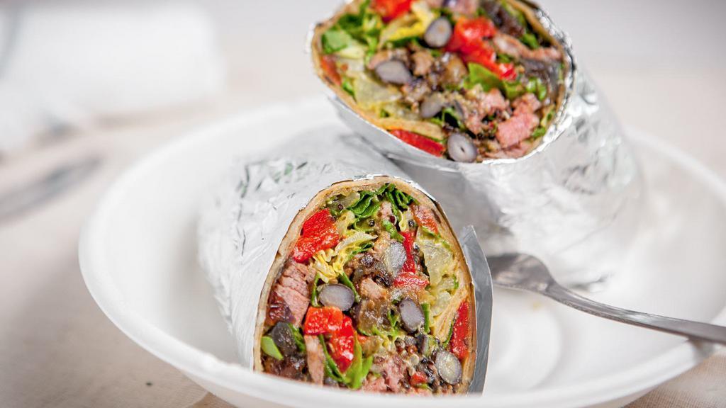 Argentine Steakhouse Wrap · grilled USDA choice flank steak • roasted red peppers • grilled red onions • tricolor quinoa • black beans • romaine crunch & baby arugula. Suggested with: Chimichurri Vinaigrette.