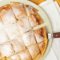 Cinnamon Dessert Pizza · Our pan-style crust smothered with cinnamon sugar butter, topped with a sweet glaze. 80-130 ...