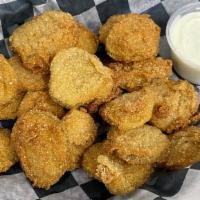 Deep Fried Pickles · Vegetarian. Breaded and deep-fried dill pickle chips served with ranch.