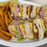 Shamrock Club · Toasted triple decker with ham, turkey, smoked bacon, American cheese, lettuce, tomato, and ...