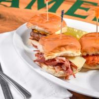 Sliders · Three sliders with your choice of corned beef with swiss, buffalo chicken tenders with chedd...