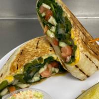 Grilled Veggie Wrap · Vegetarian. Sauteed spinach, tomato, onion, green pepper, swiss and American cheese, and top...