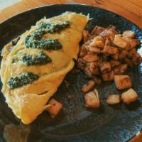Spinach, Mushroom & Chevre Omelette · portabella mushrooms, braised spinach, goat cheese, and white cheddar with basil pesto, mult...