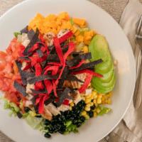Santa Fe Chicken Salad · Salad Greens topped with grilled chicken breast, avocado, corn, black beans, tomatoes, chedd...