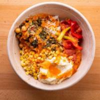 Garden Rice Bowl · Roast red peppers, braised kale and chickpeas, corn, pickled peppers, northern beans and hum...