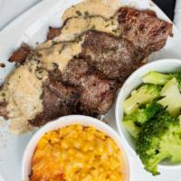 Lamb Chop Dinner · Four chops with Celebrity sauce, two  sides ,corn bread muffin.