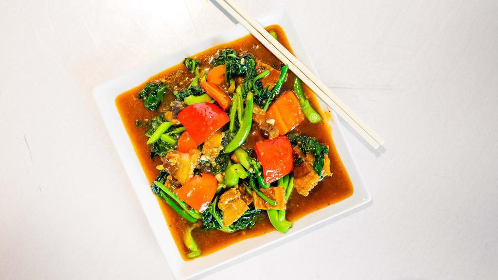 Pad Kana · Chinese broccoli stir-fried in house garlic sauce. Recommend with pork belly.