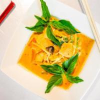 Panang Curry · Spicy. Coconut panang curry sauce stir-fried with green bell pepper, baby corn, bamboo shoot...