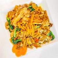 Drunken Noodle · Contain eggs. Spicy. Thai wide rice noodles stir-fried with Chinese broccoli, broccoli, scal...