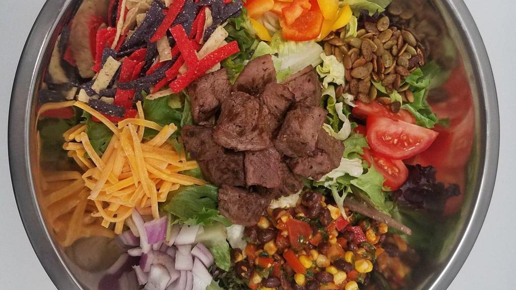 Chipotle Steak Salad · Grilled Steak, mixed Greens, Black
Bean-Corn Salad, Crisp Tortilla, Cheddar, Pepitas, Bell
Pepper, Onion, Tomato,
Ranch Dressing