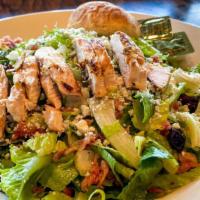 Michigan Salad · Crisp romaine, grilled chicken, dried cherries, crumbled bleu cheese and bacon. Served with ...